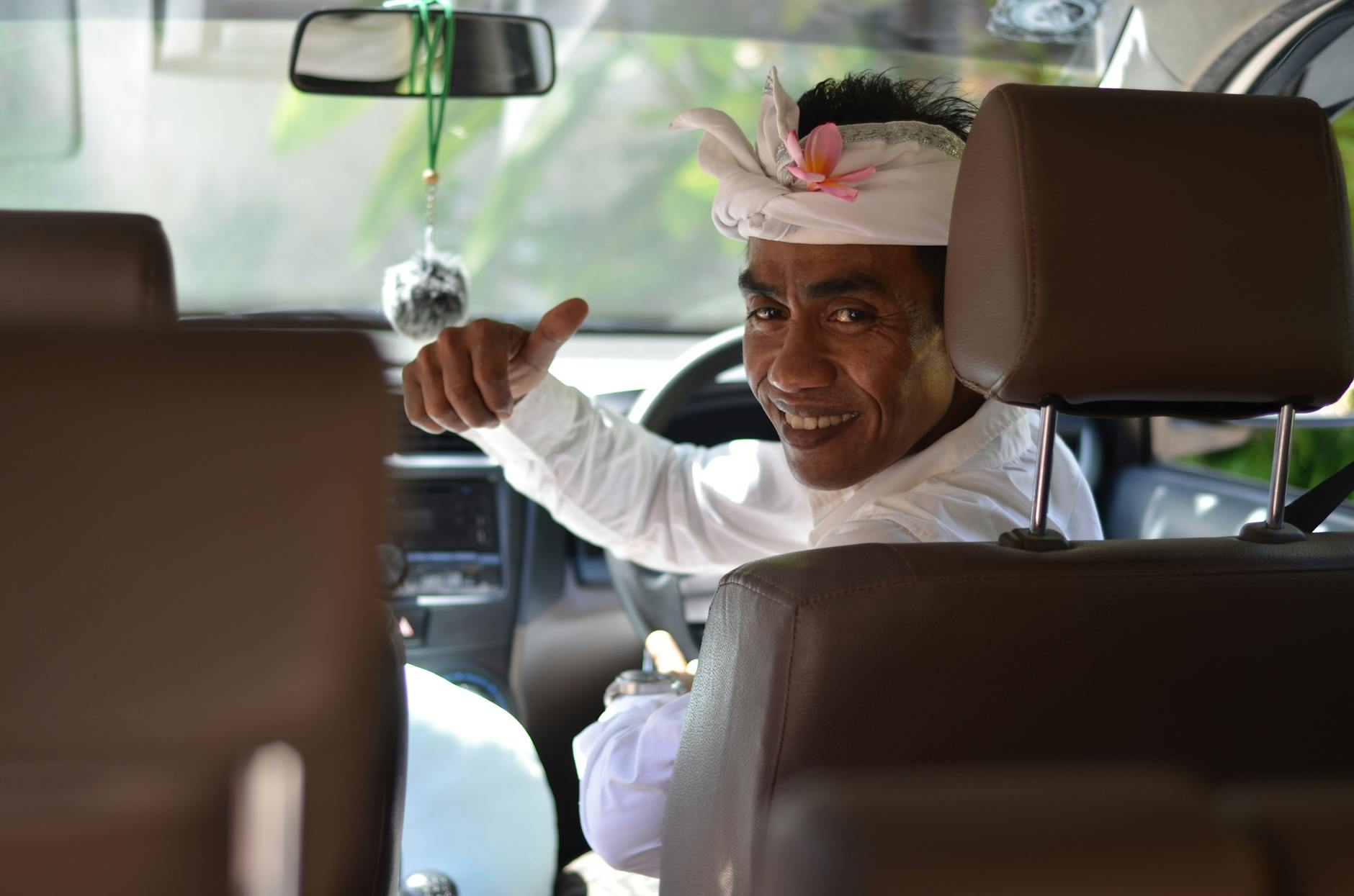 a man sitting inside the car